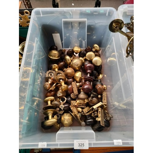 325 - A Box containing a large quantity of antique wood and brass door handles and sash window brass locks... 