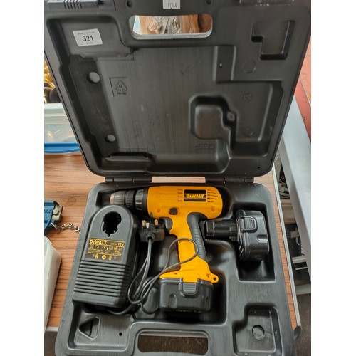 321 - Dewalt cordless drill with spare battery and charger.