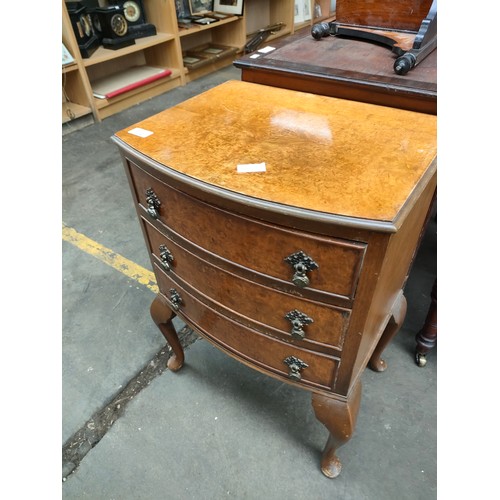 302 - 1940's 50's burr walnut three drawer side chest, supported on queen anne legs.