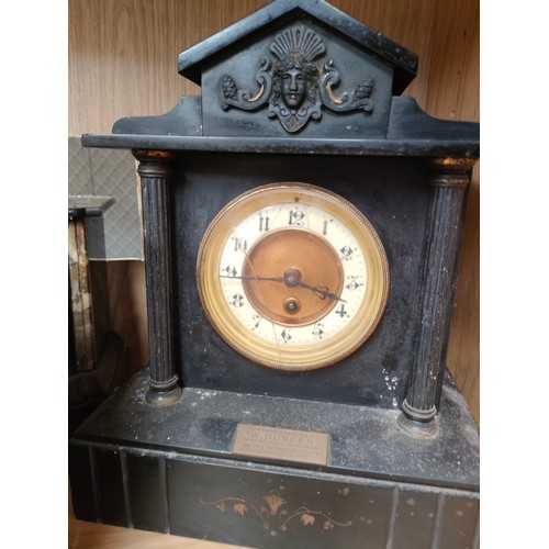 297 - A Shelf of four slate mantel clocks, Three with workings.