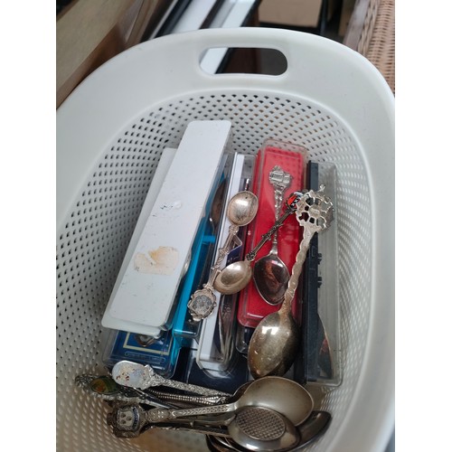 368 - Two baskets of collectable tea spoons