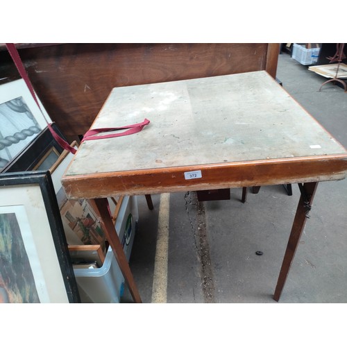 372 - Folding card table together with hexagonal table top with eastern beadwork skirt