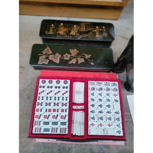 378 - Mah-Jongg set in fitted carry case, two antique oriental lacquered glove boxes and a carved elephant... 