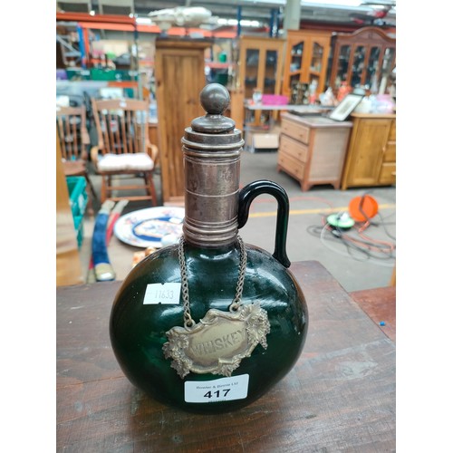 417 - Antique Green Glass decanter fitted with a whisky label