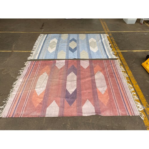 422 - 2 Eastern themed rugs