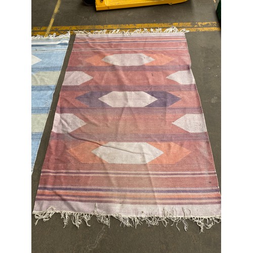 422 - 2 Eastern themed rugs