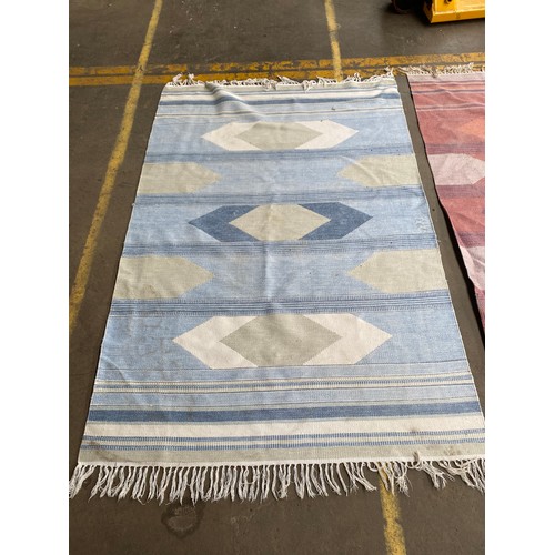 422 - 2 Eastern themed rugs