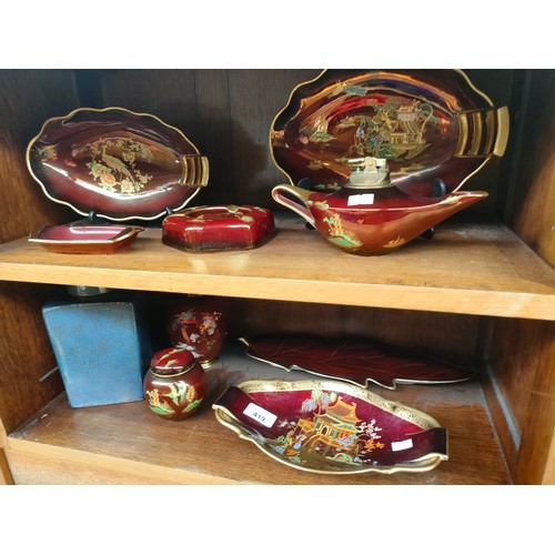 419 - 2 Shelves of Carlton ware Rouge Royale pattern includes Table lighter in pagoda pattern, lustre dish... 