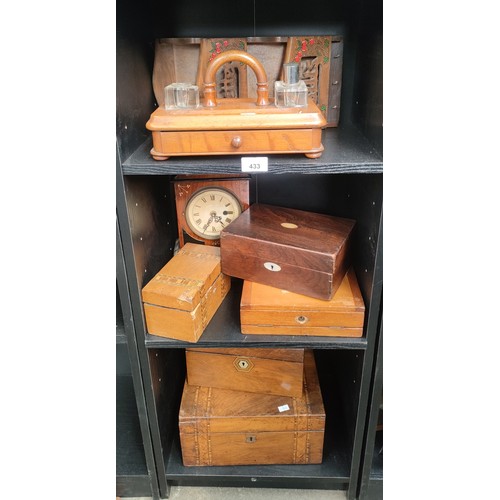 433 - Three shelves of antique wooden items to include document boxes, writing slopes, tea caddy, mantel c... 