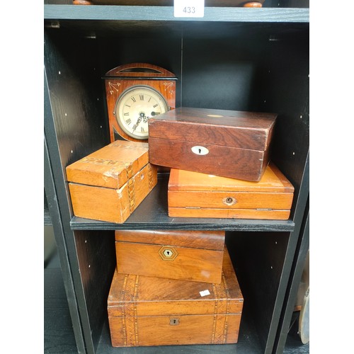 433 - Three shelves of antique wooden items to include document boxes, writing slopes, tea caddy, mantel c... 