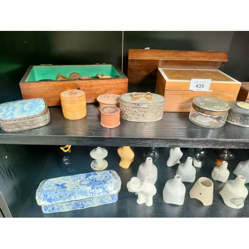 435 - Three shelves of collectables to include trinket boxes, Selection of vintage pie funnels and victori... 