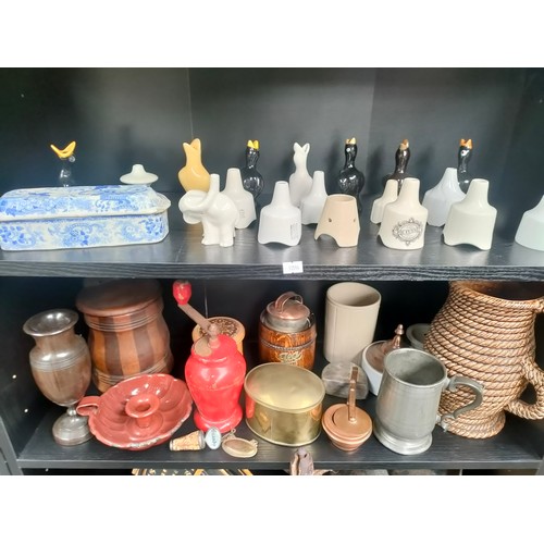 435 - Three shelves of collectables to include trinket boxes, Selection of vintage pie funnels and victori... 