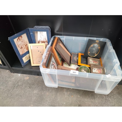 441 - Shelf of antique photo frames of various sizes.