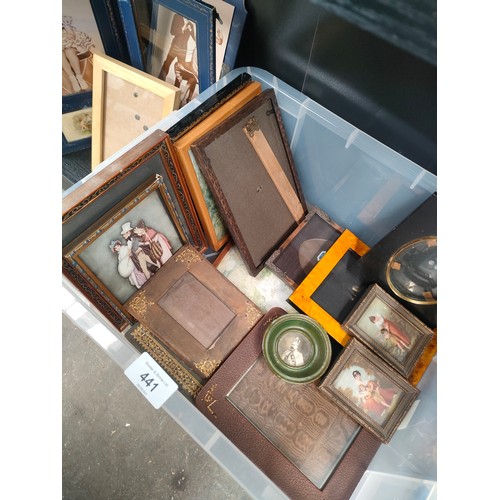 441 - Shelf of antique photo frames of various sizes.