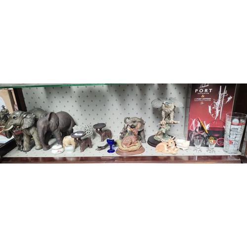 453 - Shelf of animal figures and boxed port decanter set in box.