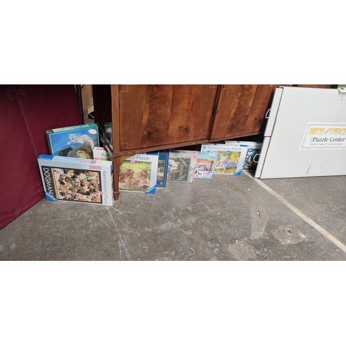 454 - Selection of boxed jig saw puzzles.