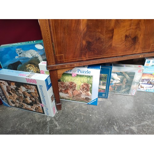 454 - Selection of boxed jig saw puzzles.