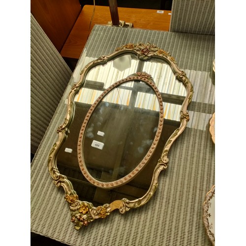 486 - Two Mid Century Atsonea floral pattern wall mirrors.