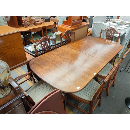 491 - Large mahogany extendable dining table with six chairs.