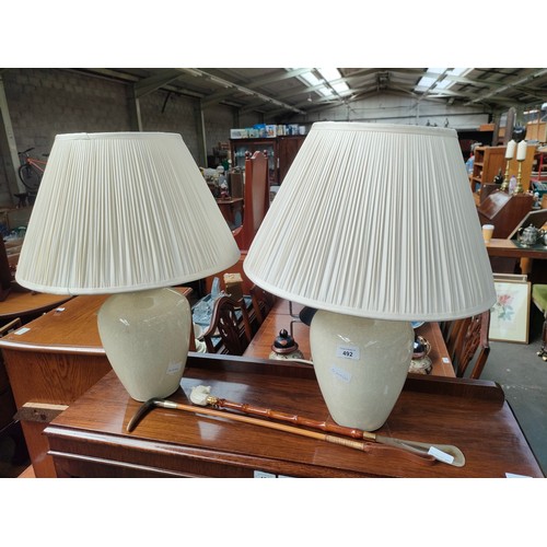 492 - Two large crackle glaze table lamps and shades together with antique ladies/childs riding crop and s... 