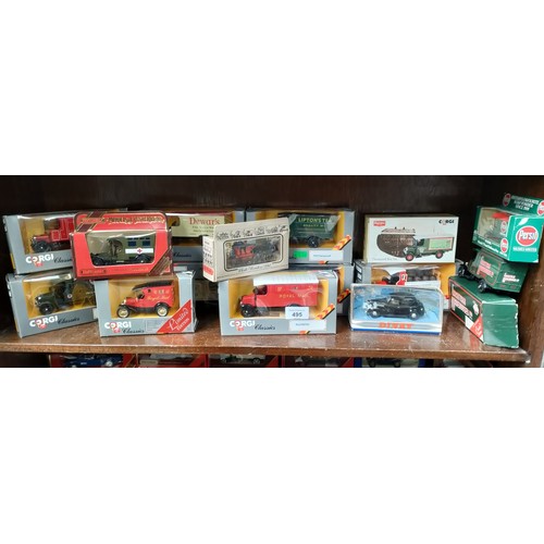 495 - Shelf of boxed Corgi and Dinky vehicles.