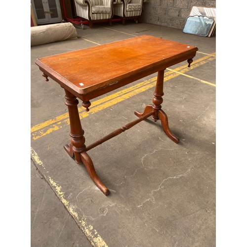 499 - Victorian console table with turned supports.