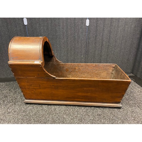 528 - 19th century mahogany child's crib. Fitted with ball bearing castors. [63x98x42cm]