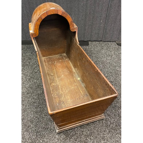 528 - 19th century mahogany child's crib. Fitted with ball bearing castors. [63x98x42cm]