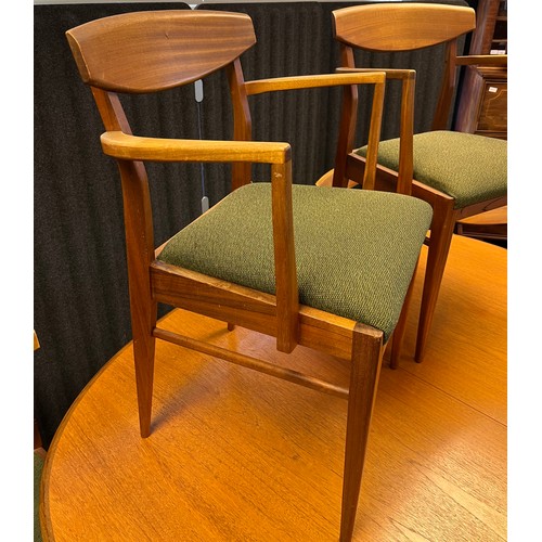 534 - Mid century teak G- Plan dining table with four chairs and two carvers. [Table-72x162x107cm]