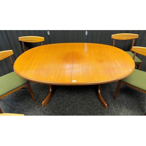 534 - Mid century teak G- Plan dining table with four chairs and two carvers. [Table-72x162x107cm]