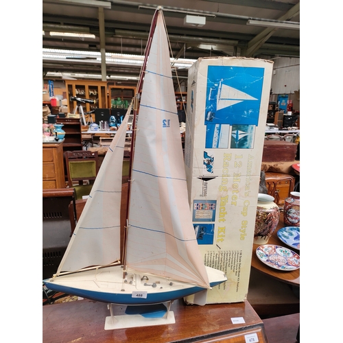 536 - A large American racing yacht with box