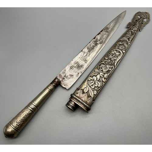 91 - Antique Argentine Dagger with possible silver worked sheath and handle.