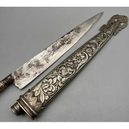 91 - Antique Argentine Dagger with possible silver worked sheath and handle.