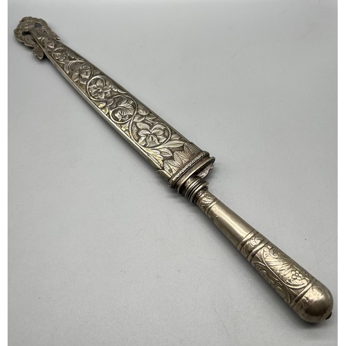 91 - Antique Argentine Dagger with possible silver worked sheath and handle.