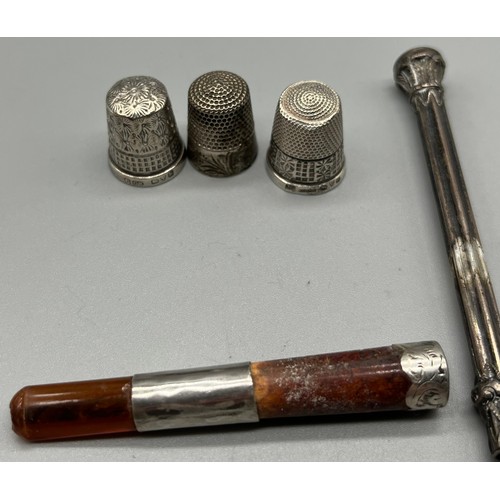 79 - Antique Birmingham silver and yellow metal trims cheroot holder and cheroot. Three silver thimbles a... 