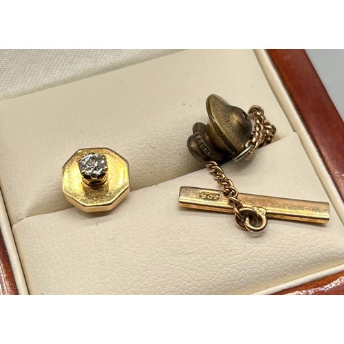 71 - 9ct yellow gold and single diamond stud pin. 0.17ct diamond.