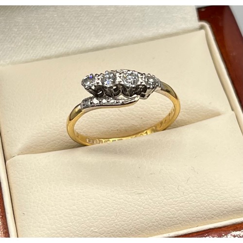 70 - Ladies 18ct yellow gold and diamond stone ring. Set with four round cut brilliant white diamonds. 0.... 