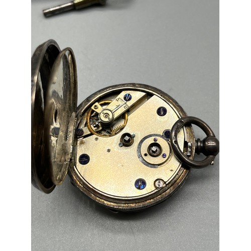 59 - Swiss silver cased fob pocket watch produced by H. Samuel. Comes with a key. [Non Runner]