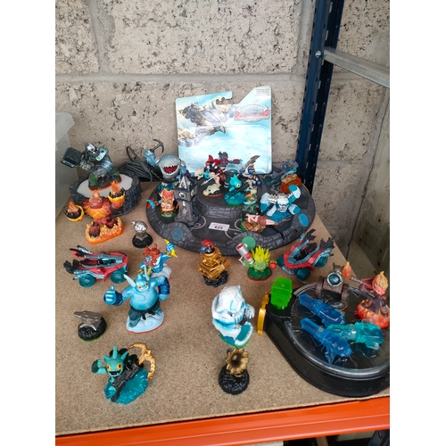 362A - A large selection of Xbox 360 Skylanders figures includes stands etc