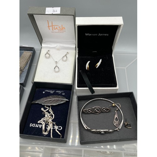 88 - A Collection of costume jewellery and silver jewellery. Includes Jade carved pendant, Silver gate br... 