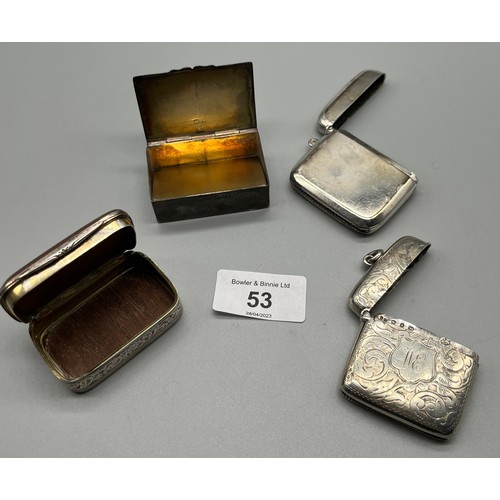 53 - Four silver items. Chester silver pill box with removable silver divider, Two Birmingham silver vest... 