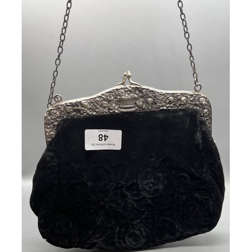 48 - Three antique ladies bags to include London silver chainmail bag, Ornate silver and black fabric bag... 