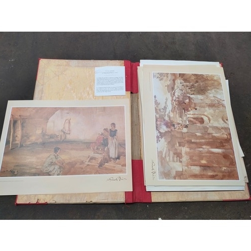 298 - Portfolio containing various art prints and artworks to include watercolour depicting loch signed T.... 