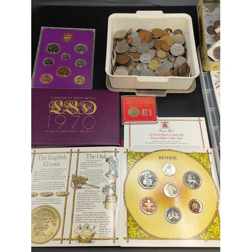 65 - Two large trays of collectable world coins and cased commemorative UK coins set