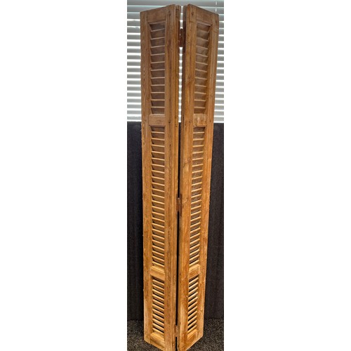 81 - A Pair of large antique pine window shutters. [207.5cm high- 46.5cm wide]