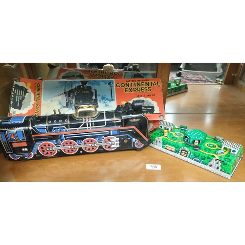 112 - A Continental Express tin plate train with original box and a tin plate Abtotpacca Russian clockwork... 