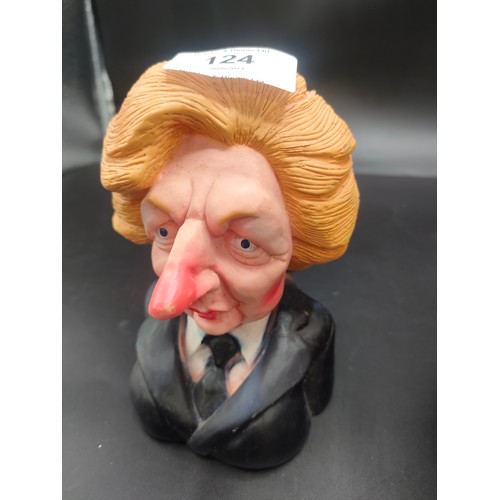 124 - 1984 spitting image Margaret Thatcher squeaky toy together with Greg Norman golf club cover