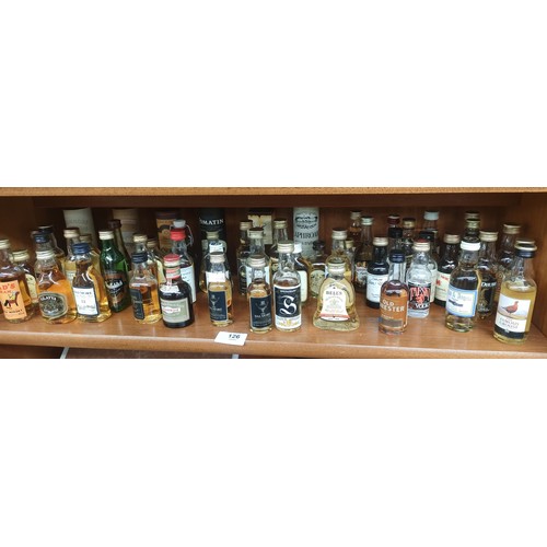 126 - A large collection of whisky miniatures