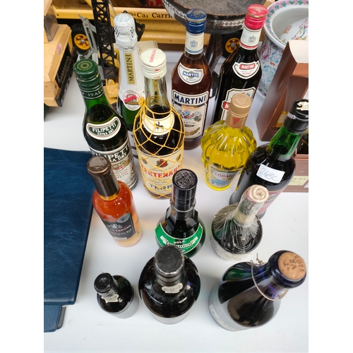 133 - Selection of alcoholic beverages includes Martini etc