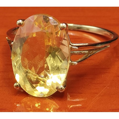 47 - 10ct yellow gold ring set with a large citrine style gem stone. [Ring size P] [2.69Grams]